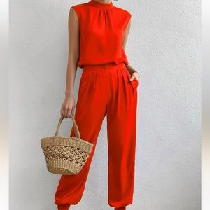 Mock neck sleeveless top & slant pocket pants with pleats